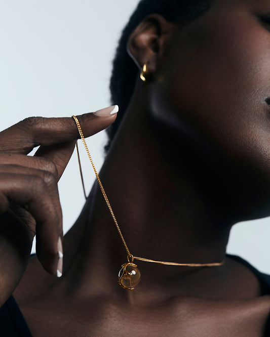 WILD MOON CLEAR QUARTZ NECKLACE - Spinning Moon Pendant