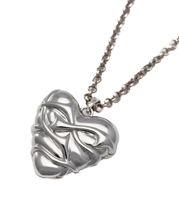 Silver heart-shaped pendant locket on a chain against a white background