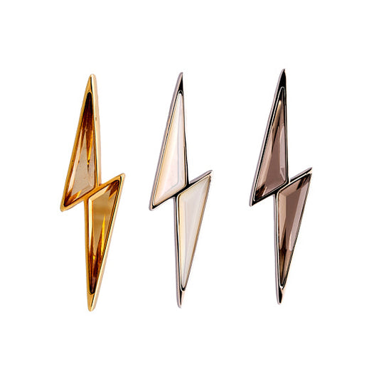 Three gold lightning bolt-shaped earrings on a white background