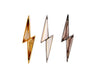 Three gold lightning bolt-shaped earrings on a white background